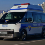 Kia PV5 véhicule de police électrique IA drone